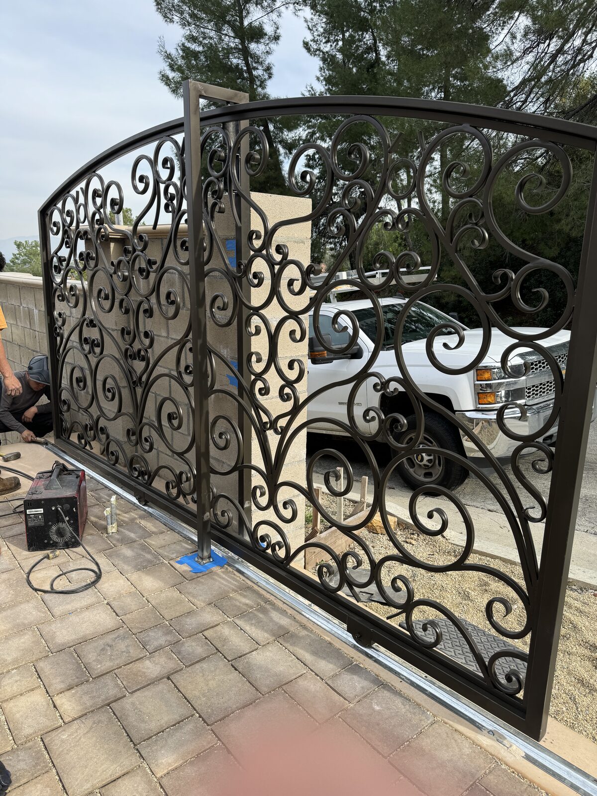 Custom wrought iron driveway gate installed by Metro GDS in Los Angeles